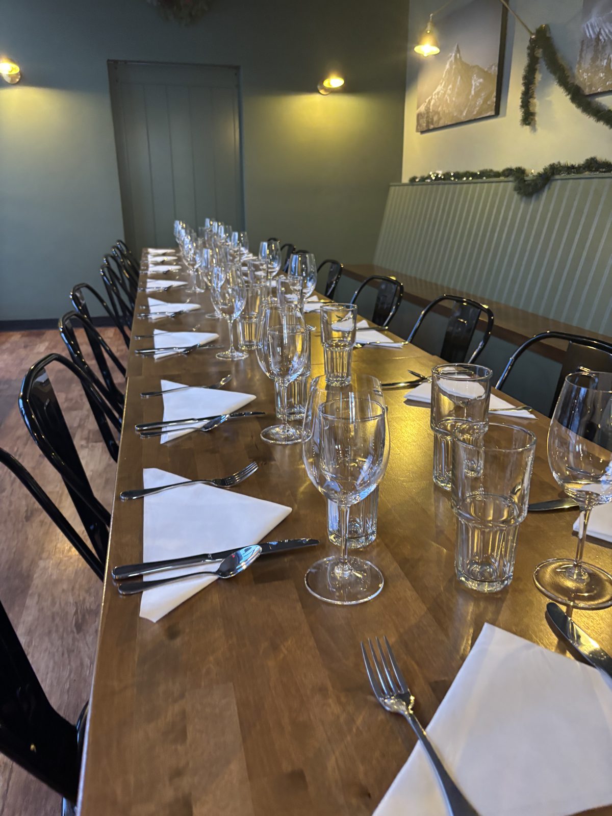 Place settings and glassware along the table